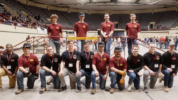 The Steel Bridge Competition team with the bridge that they built