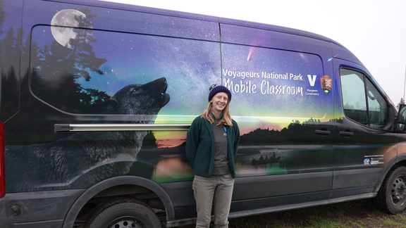Moss Schumacher in front of the Voyagers mobile classroom