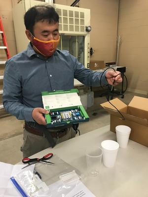 Professor Shimotori with his kit's computer