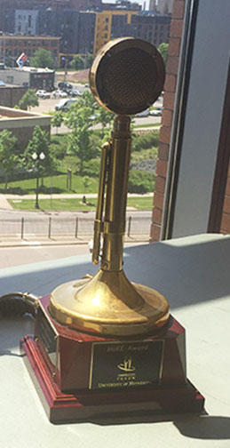 David Cowardin's black and gold U of M MIKE Award sitting on a window ledge