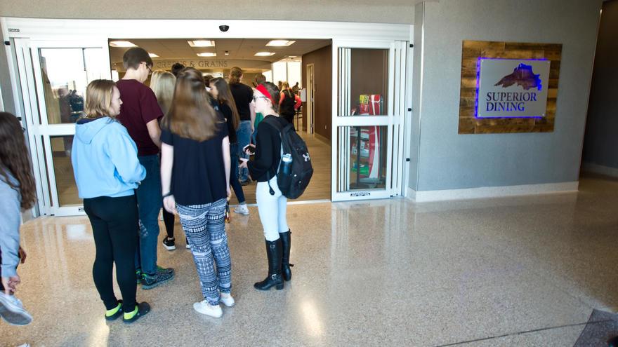 Students in line outside a cafeteria