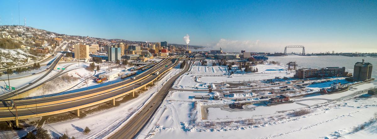 An aerial image looking north along I35 above Lot D and the Duluth waterfront/