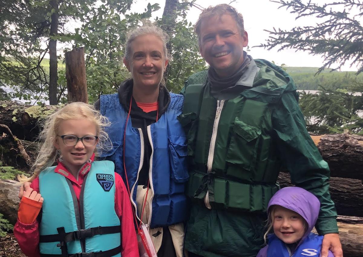 Kevin Stanke with his partner and two daugthers in the scenic Boundary Waters
