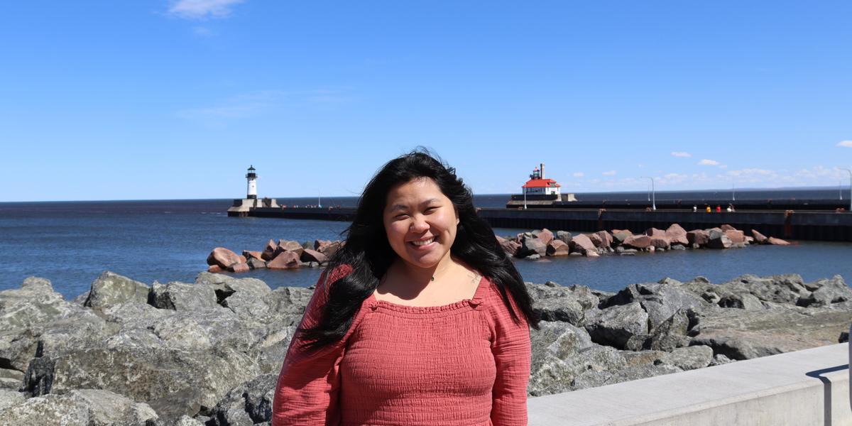 Rose Yang posing for a photo at the Duluth Downtown Canal boardwalk.