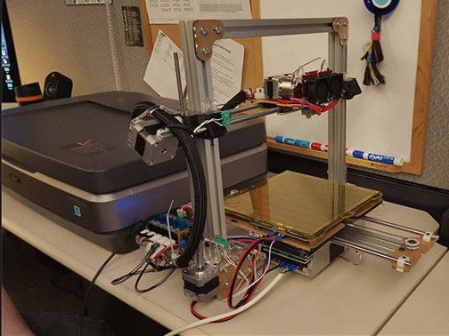 Student Alex Stecker built the 3D printer shown above from a kit.