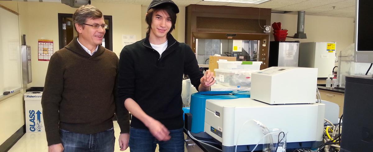Professor Victor Nemykin and UMD senior Alexander King in one of UMD's Chemistry labs.