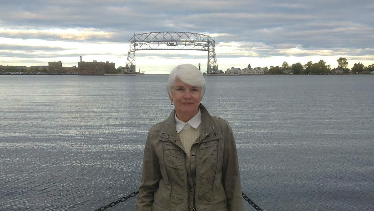 Ann Lewis, with the Duluth lift bridge in the distance behind.