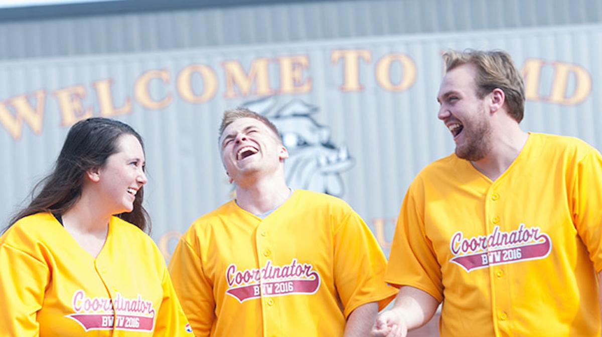 Welcome week coordinators share a laugh.
