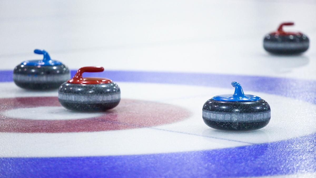 an image of curling stones