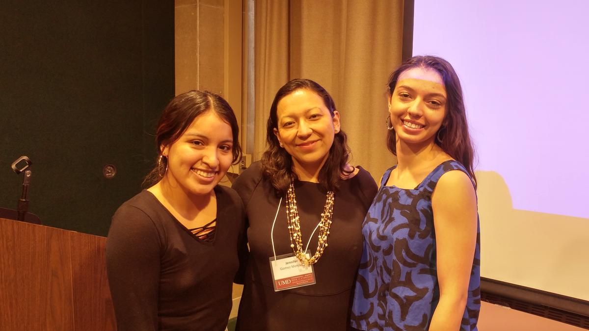 UMD World Languages & Cultures faculty Jennifer Gómez Menjívar and Carol Wallace with student