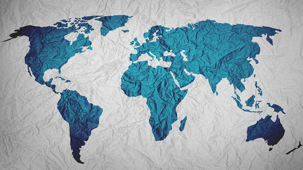 Blue map of the world on grey background