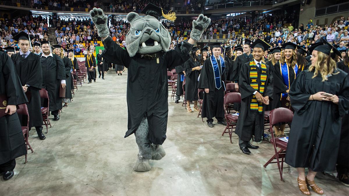Champ at the 2016 commencement at Amsoil Arena