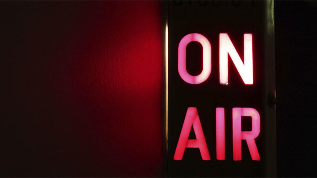 An image of a radio "On Air" sign
