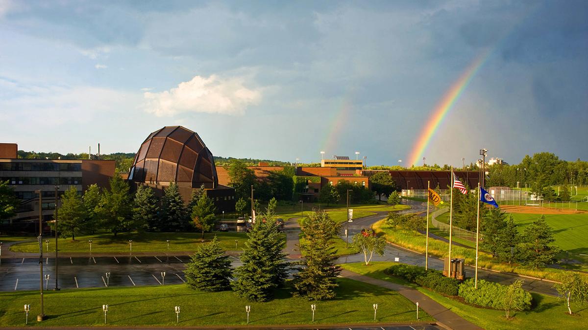 UMD campus with double rainbow in the sky