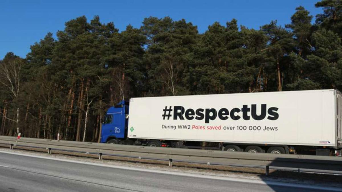 White truck with #RespectUs on the side