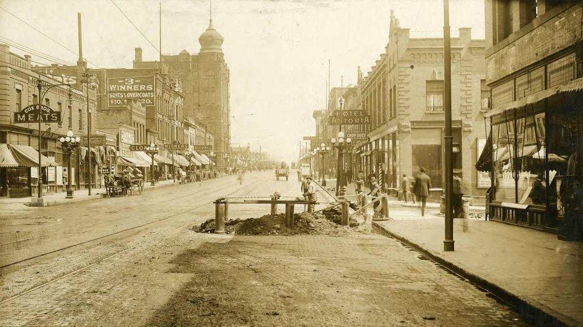 Sepia colored photo of Superior Street in the early 20th century. From Glensheen's "Reporting Duluth" exhibit