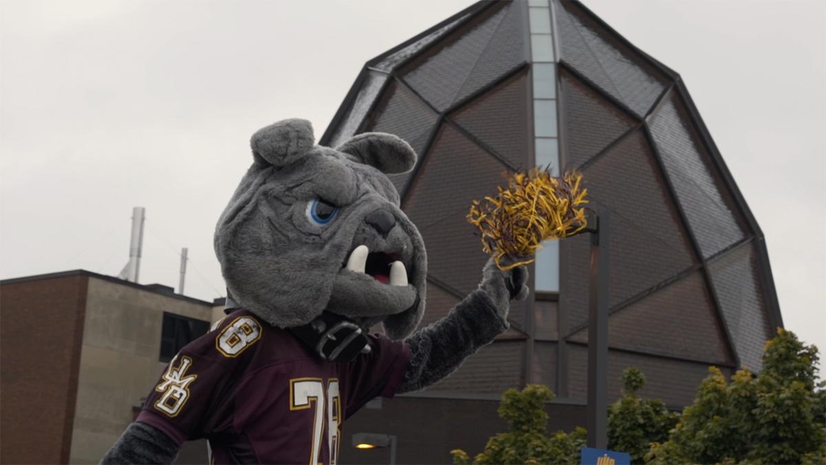 Champ with Webber Music Hall in the background during the 2017 Homecoming