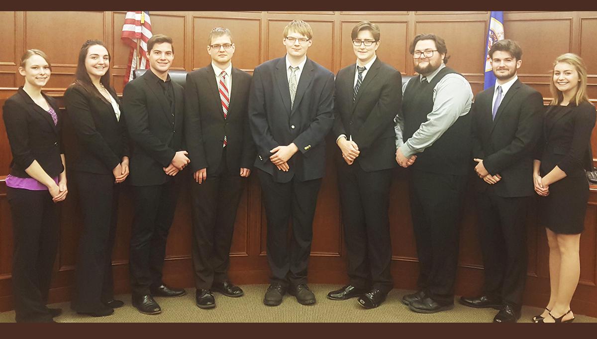 UMD's Mock Trial team in a judicial chamber