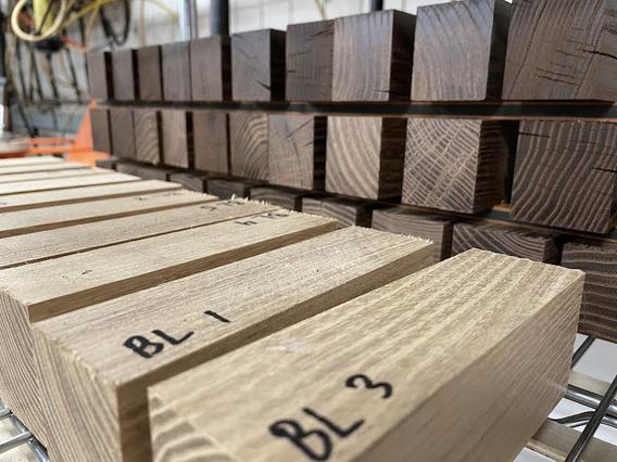 Stacks of sample lumber under-going the testing process