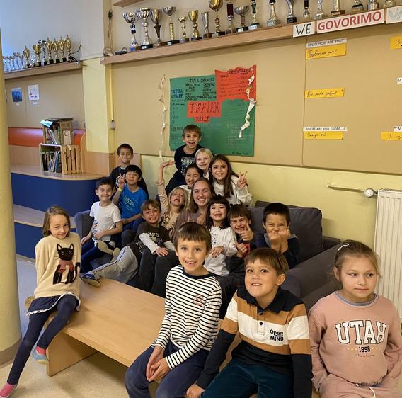 Molly Hughes with students in the classroom at Danila Kumar International School in Slovenia.