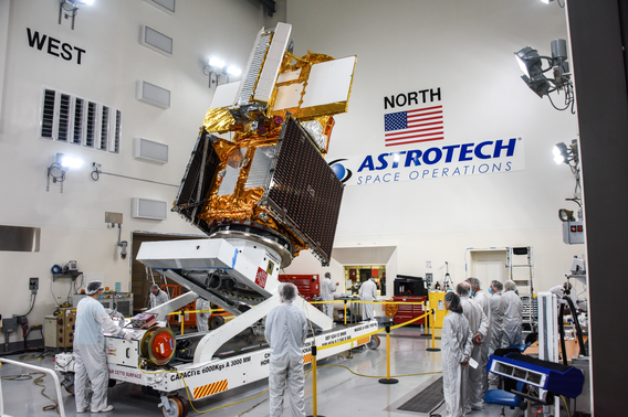 SWOT Spacecraft is moved into a transport container inside the Astrotech facility at Vandenberg Space Force Base in California.