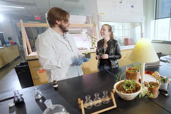 UMD undergraduate students Rory Westerman (Biology) and Jenny Ruliffson (Biochemistry) collaborate in the Heikkila Chemistry & Advanced Materials Science Building (HCAMS).