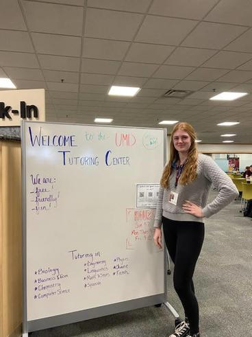 Karli Young at the entrance to the tutoring center