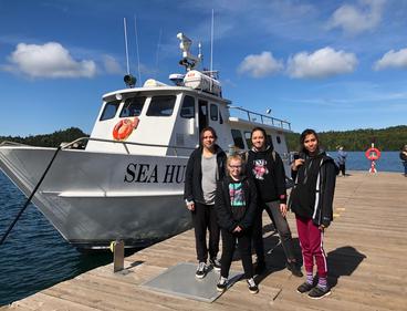 Four participants in the Voyage to Discovery program: Nedda Ramona Raine, Amelie Raine, Annelise Hecker and (front) Madison Sundvick.