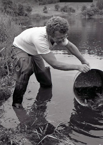 A biology student at Bagley Pond