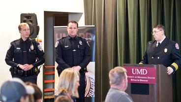 UMD police officers being awarded by the Duluth City Fire Department
