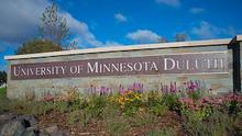 A photo of a sign reading "University of Minnesota Duluth"