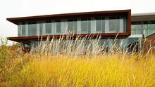 UMD"s Labovitz School of Business & Economics building with fall grass in foreground
