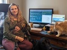 UMD Natural Resources Research Institute's researcher Adelle Keppers with her dog and two cats