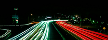 Night shot of headlights on a highway