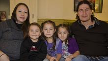 An American Indian man and women with three little girls 