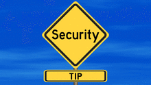 The words Security Tip on a street sign