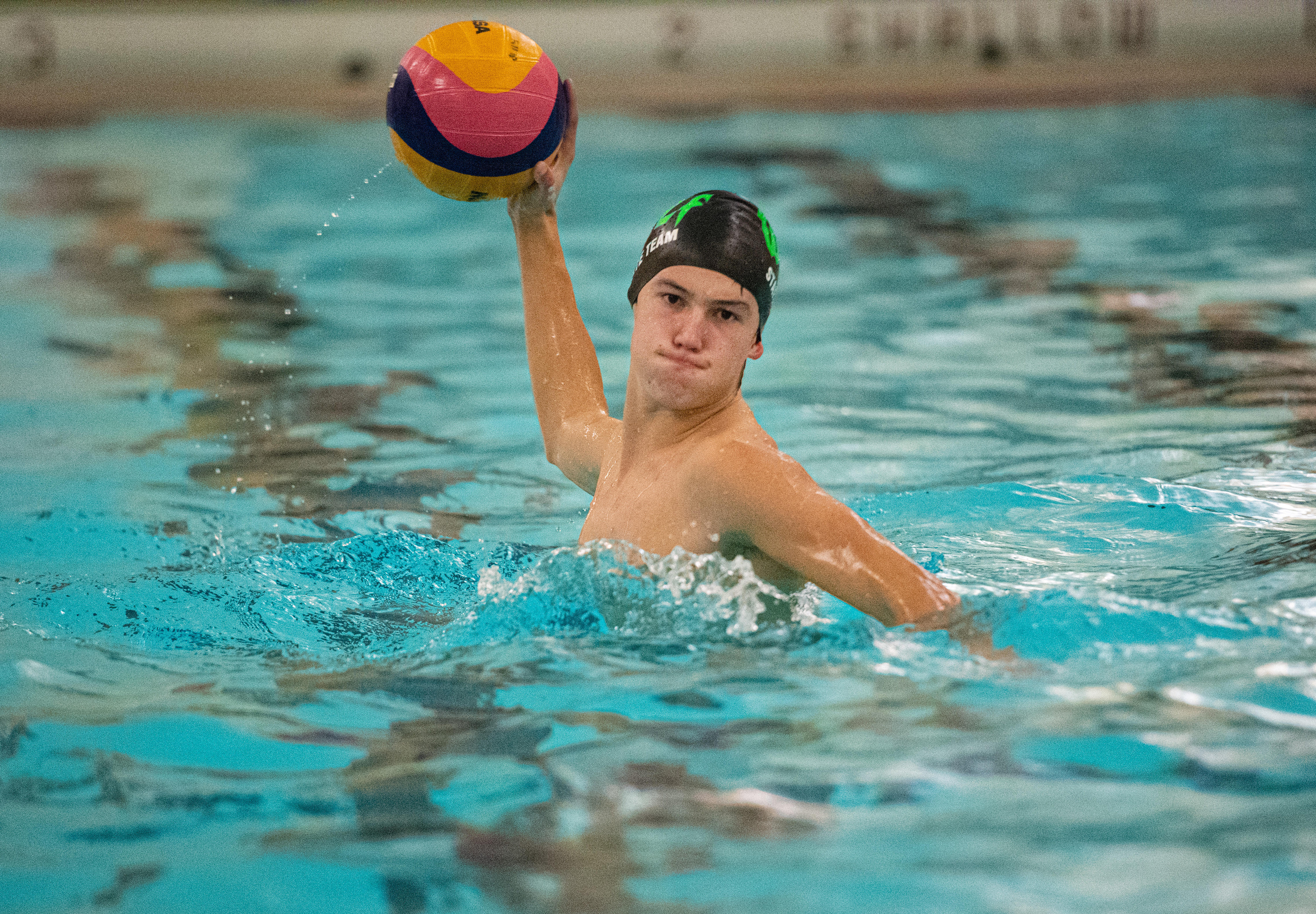 Freshman Robbie playing water polo in UMD's pool